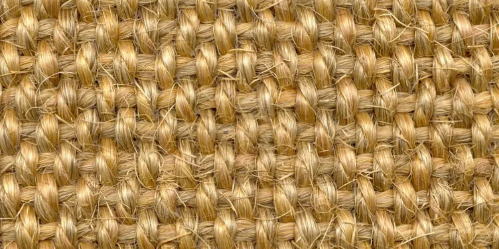 Rond sisal vloerkleed in Yucatan: waarom de knoop rond zo mooi uitkomt